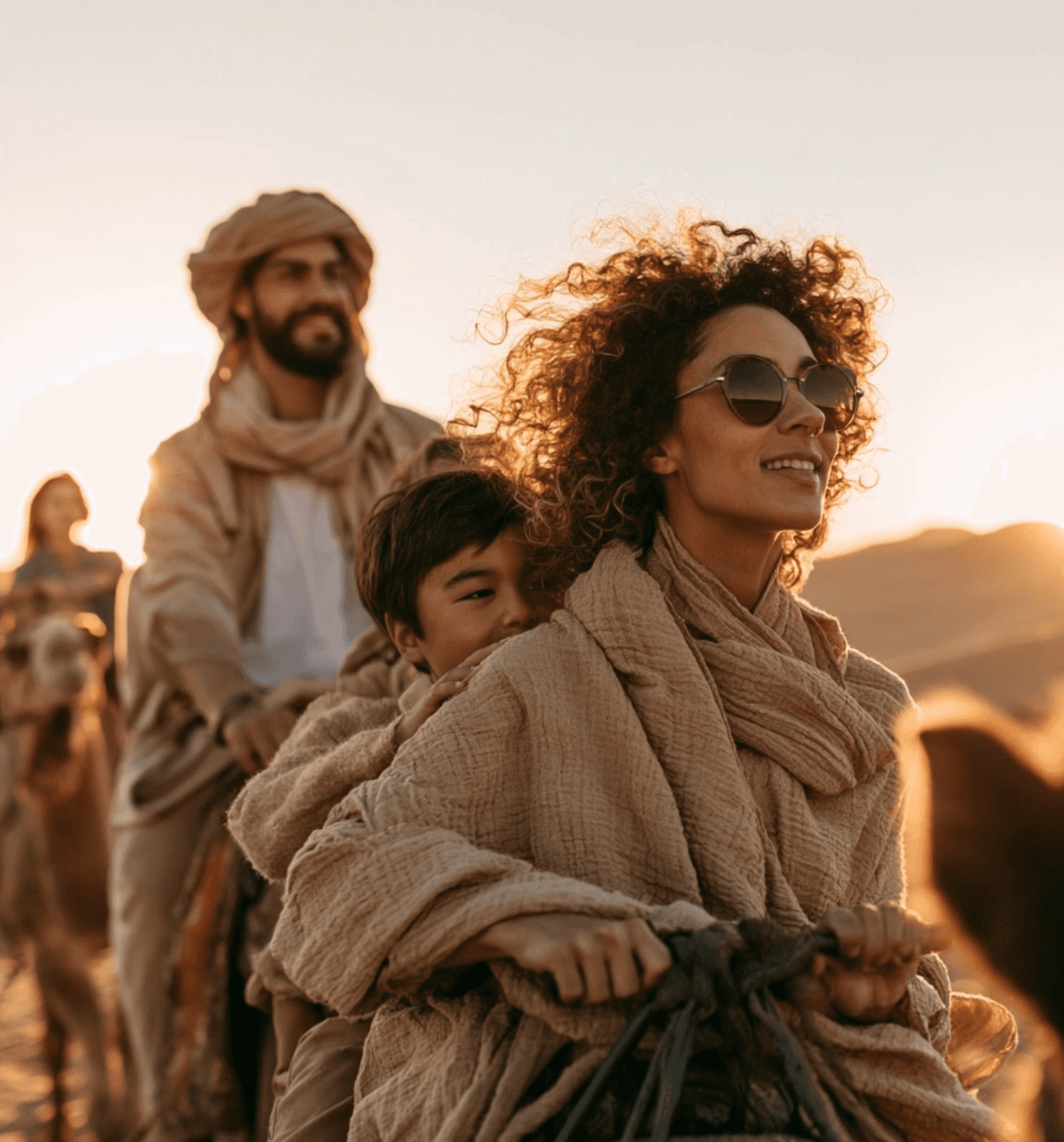 family on camel in the desert